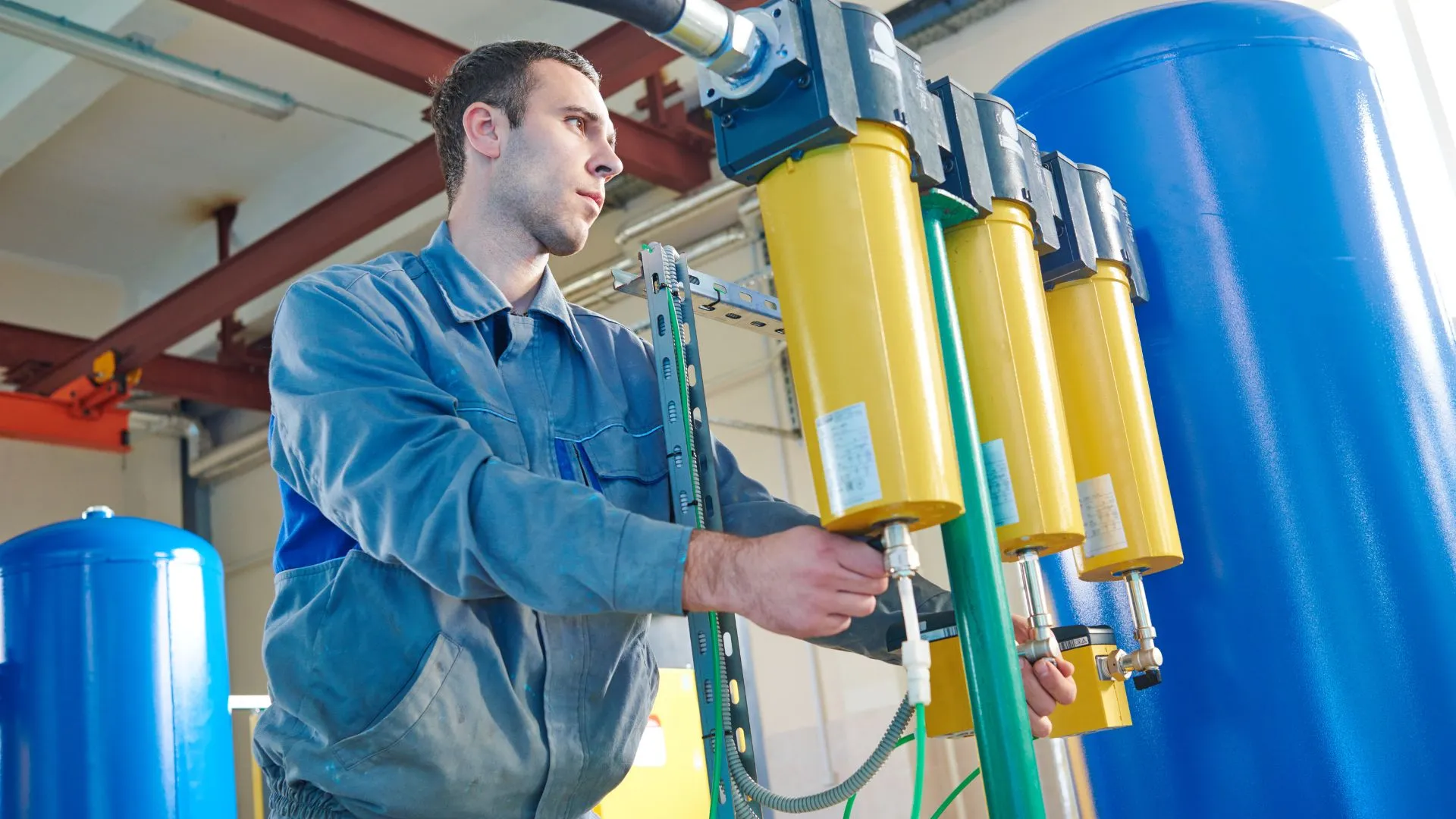 Technician checking water softener system, water softener repair